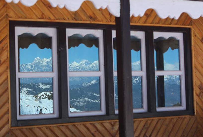 Mt. Everest view through lodge window -  himaland.com